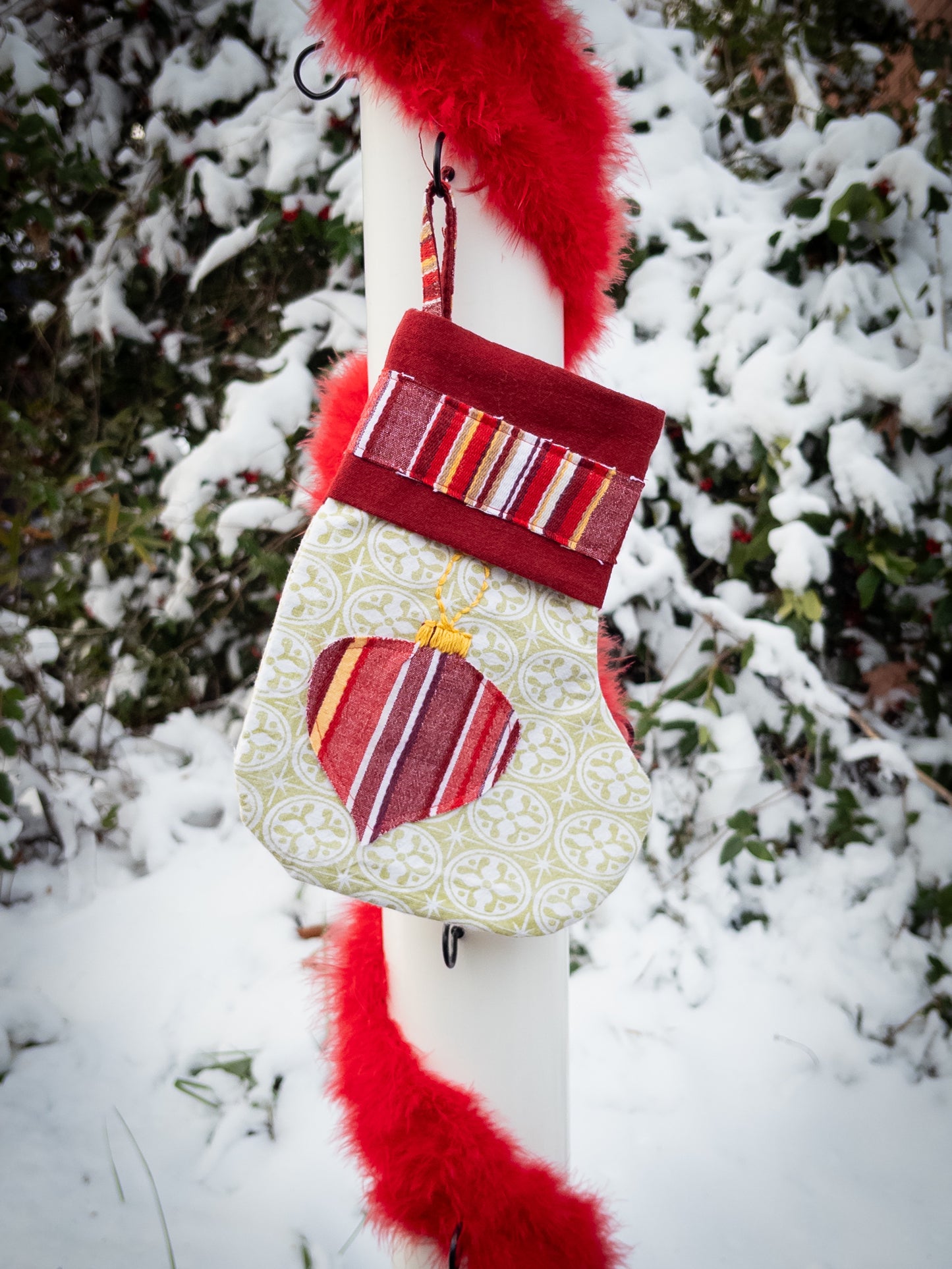 Green pointietta patchwork stocking