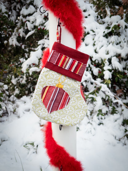 Green pointietta patchwork stocking