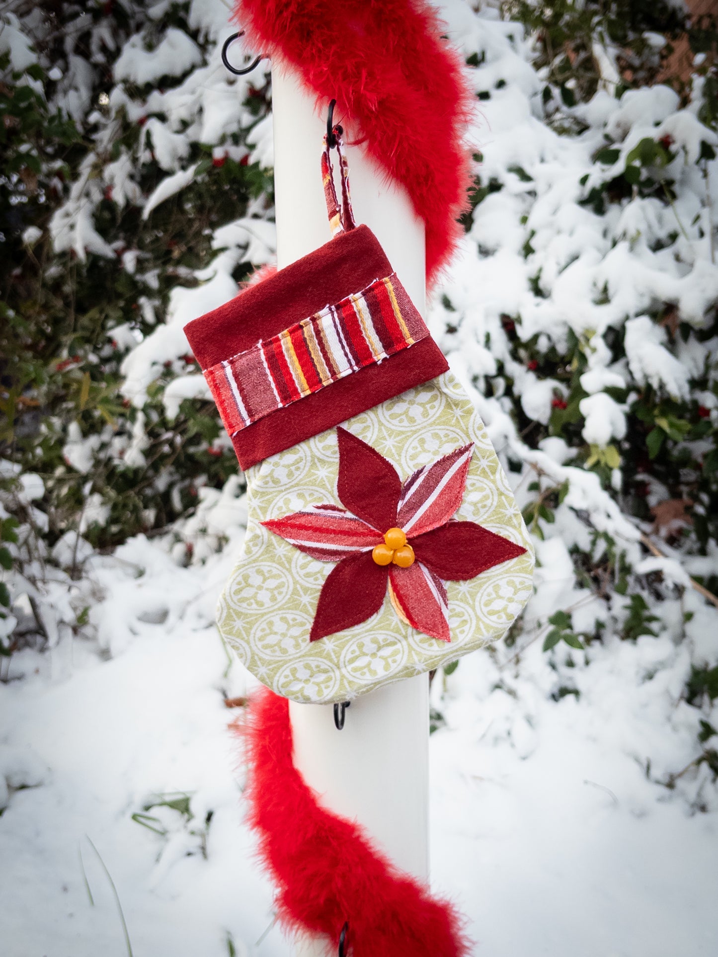 Green pointietta patchwork stocking
