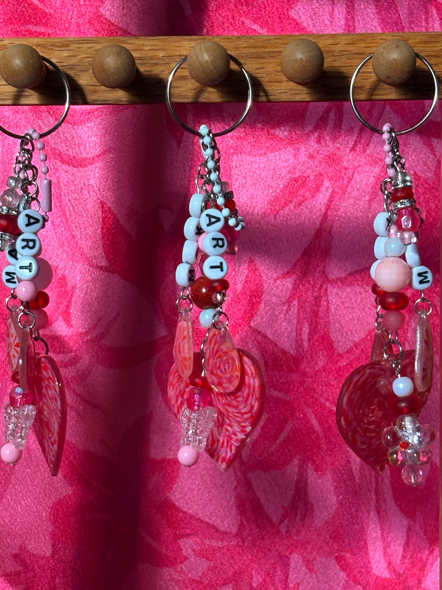 Hand painted swirly heart beaded bag charm